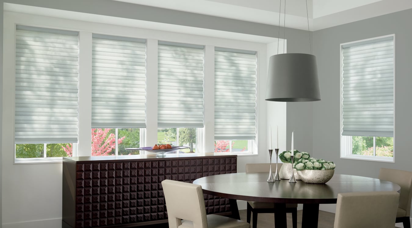 Cordless motorized shades in a San Diego dining room